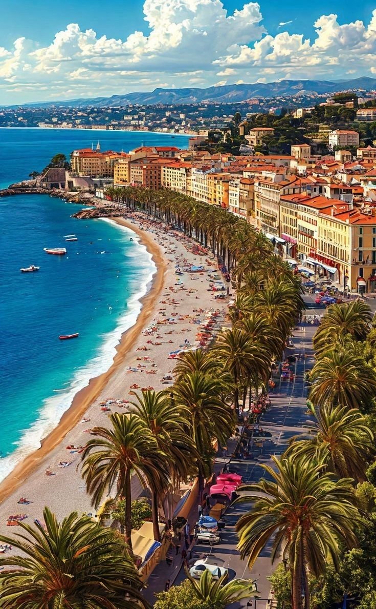 This may contain: the beach is lined with palm trees and buildings